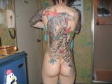 Strong erotic image tattooed on an important female body like cosplay